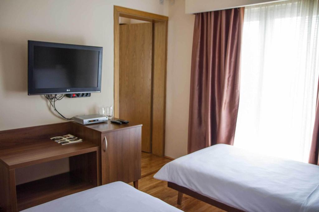 Hotel M Подгорица Номер фото